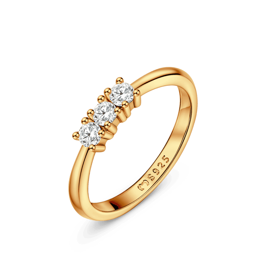 Ring mit drei leuchtenden Steinen